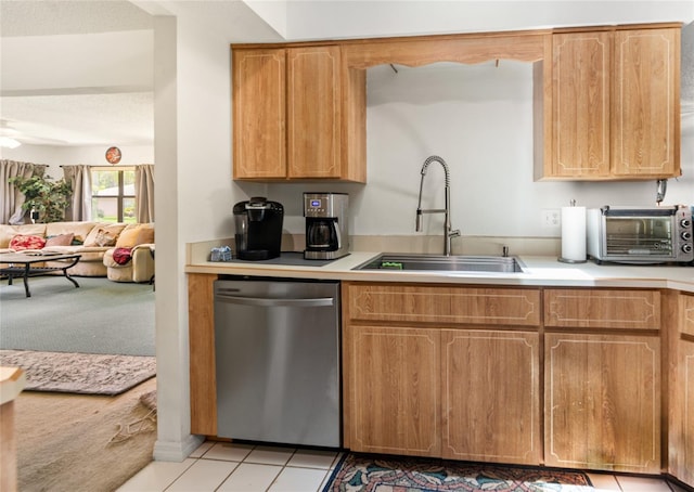 1 Ryberry Pl, Palm Coast, FL 32164 - kitchen featuring dishwasher, light countertops, open floor plan, and light colored carpet