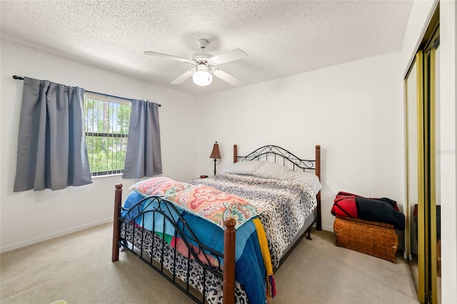 1 Ryberry Pl, Palm Coast, FL 32164 - carpeted bedroom featuring a closet, a textured ceiling, and ceiling fan