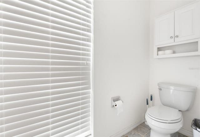 1 Ryberry Pl, Palm Coast, FL 32164 - bathroom with baseboards and toilet