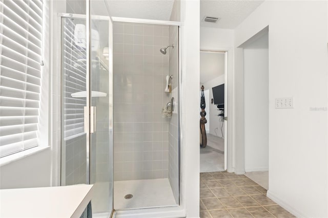 1 Ryberry Pl, Palm Coast, FL 32164 - bathroom with a shower stall and a textured ceiling