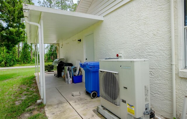 1 Ryberry Pl, Palm Coast, FL 32164 - exterior view of a cooling unit and stucco siding