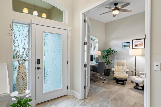 1254 Royal Pointe Ln, Ormond Beach, FL 32174 - foyer entrance with ceiling fan and baseboards