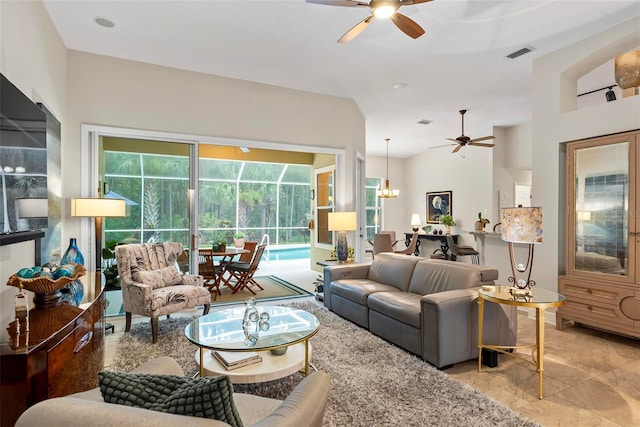 1254 Royal Pointe Ln, Ormond Beach, FL 32174 - living room with a ceiling fan and a sunroom