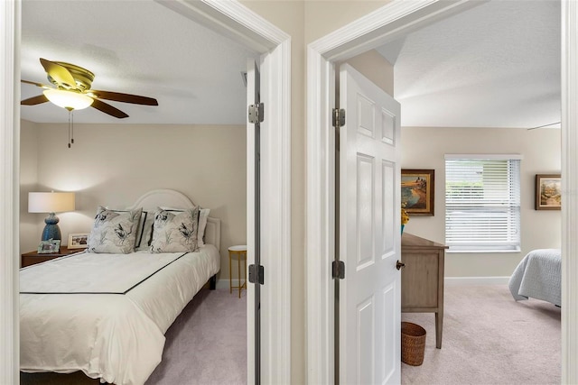 1254 Royal Pointe Ln, Ormond Beach, FL 32174 - carpeted bedroom with baseboards and ceiling fan