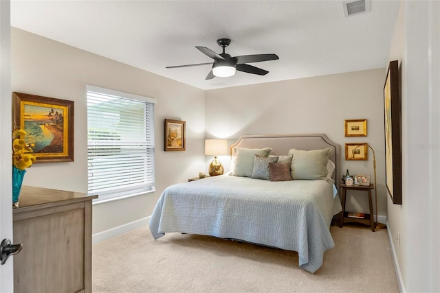1254 Royal Pointe Ln, Ormond Beach, FL 32174 - bedroom with light colored carpet and ceiling fan