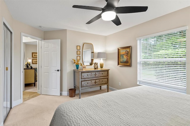 1254 Royal Pointe Ln, Ormond Beach, FL 32174 - bedroom featuring light colored carpet and a ceiling fan