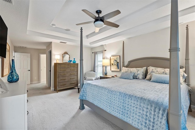 1254 Royal Pointe Ln, Ormond Beach, FL 32174 - carpeted bedroom with a raised ceiling and ceiling fan