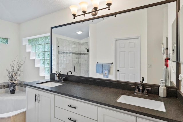 1254 Royal Pointe Ln, Ormond Beach, FL 32174 - bathroom featuring double vanity, a shower stall, and a garden tub