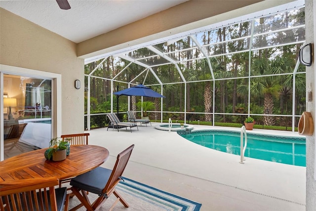1254 Royal Pointe Ln, Ormond Beach, FL 32174 - view of swimming pool with a patio area, a pool with connected hot tub, and a lanai