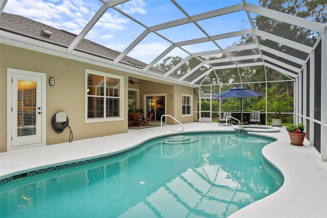 1254 Royal Pointe Ln, Ormond Beach, FL 32174 - view of swimming pool with a patio, a pool with connected hot tub, and a lanai