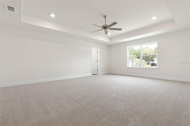 18 Slipper Orchid Trl E, Palm Coast, FL 32164 - carpeted spare room featuring a raised ceiling, ceiling fan, and recessed lighting