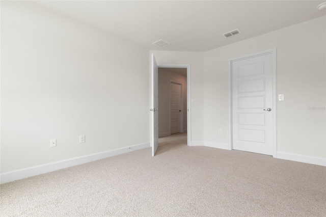 18 Slipper Orchid Trl E, Palm Coast, FL 32164 - spare room with light colored carpet and a smoke detector