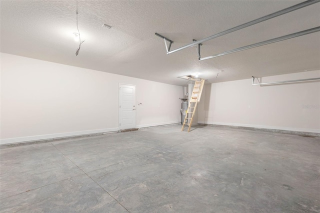 18 Slipper Orchid Trl E, Palm Coast, FL 32164 - garage featuring baseboards