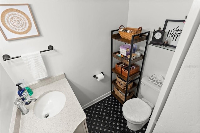 1026 Bel Aire Dr, Daytona Beach, FL 32118 - half bathroom with vanity and toilet