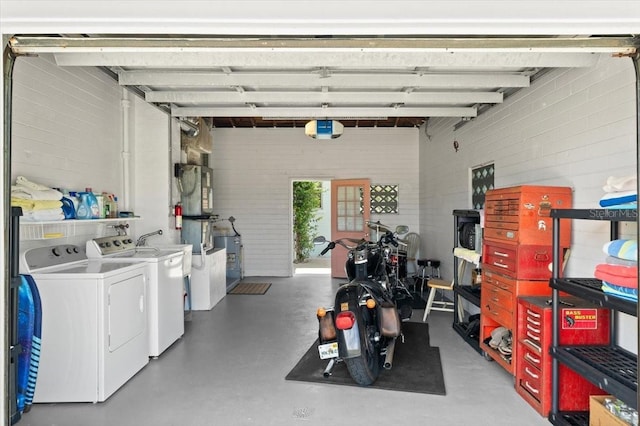 1026 Bel Aire Dr, Daytona Beach, FL 32118 - garage with washing machine and clothes dryer