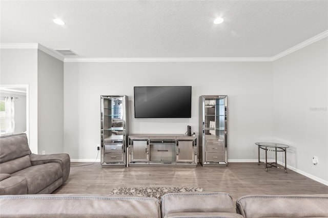 392 S Hamilton Springs Rd, Saint Augustine, FL 32084 - living room featuring crown molding, wood finished floors, and recessed lighting