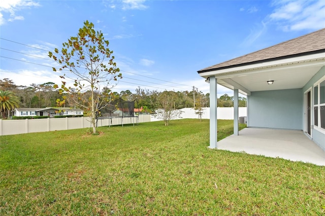 392 S Hamilton Springs Rd, Saint Augustine, FL 32084 - fenced backyard featuring a trampoline and a patio