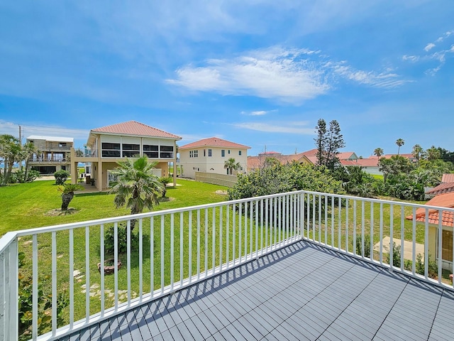 1528 N Daytona Ave, Flagler Beach, FL 32136 - deck with a lawn and a residential view