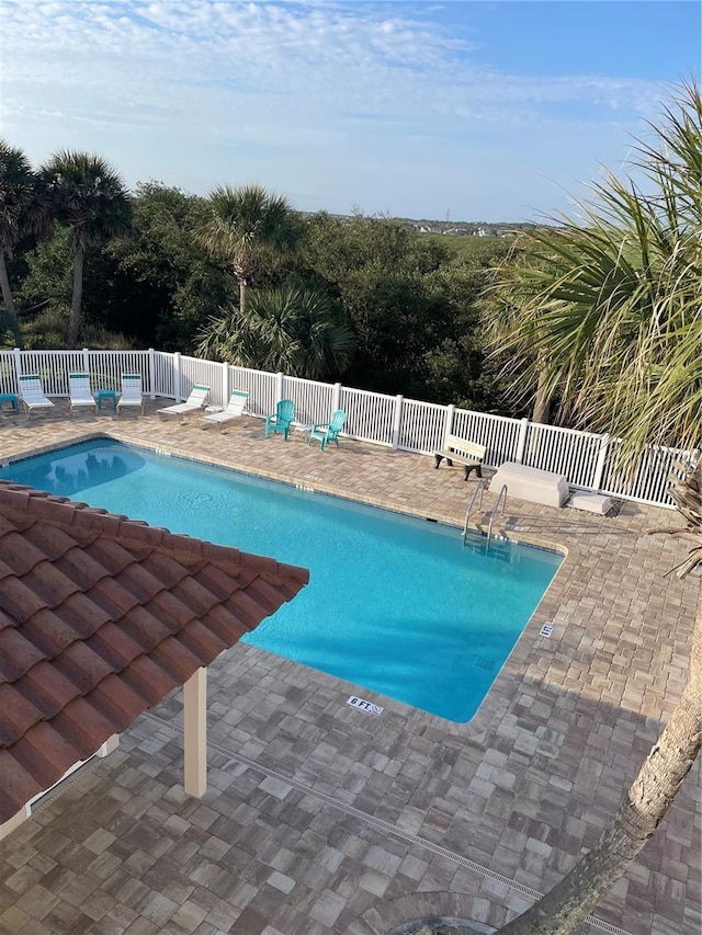 1528 N Daytona Ave, Flagler Beach, FL 32136 - community pool with a patio area