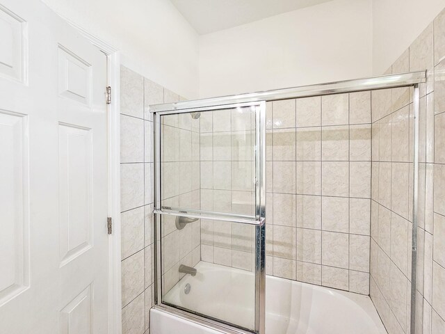 1528 N Daytona Ave, Flagler Beach, FL 32136 - full bathroom with combined bath / shower with glass door