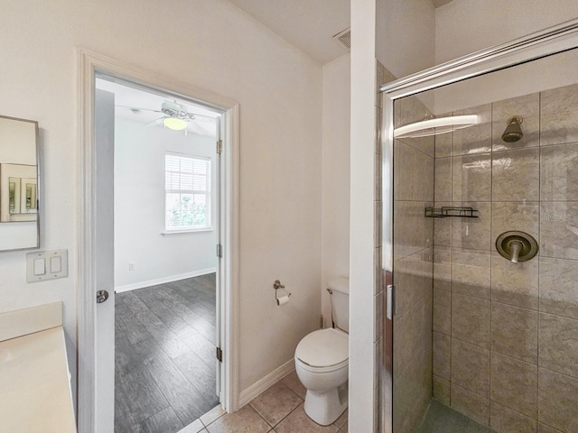 1528 N Daytona Ave, Flagler Beach, FL 32136 - full bath featuring a stall shower, a ceiling fan, and tile patterned flooring