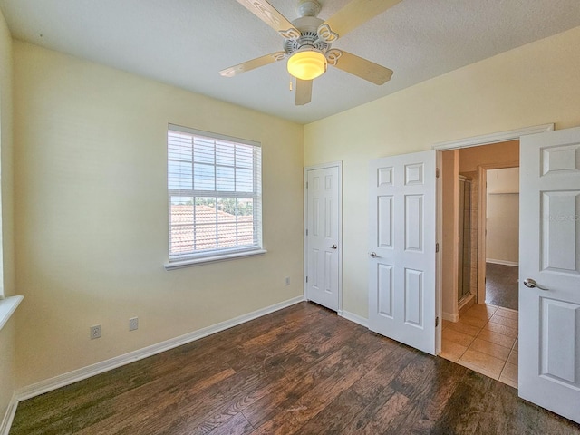 1528 N Daytona Ave, Flagler Beach, FL 32136 - unfurnished bedroom with wood finished floors and a ceiling fan