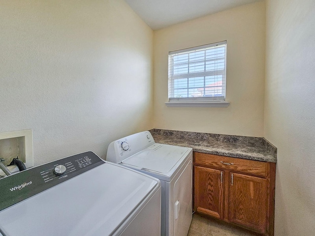 1528 N Daytona Ave, Flagler Beach, FL 32136 - washroom with independent washer and dryer, cabinet space, and light tile patterned floors