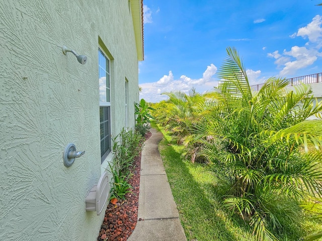 1528 N Daytona Ave, Flagler Beach, FL 32136 - view of home's exterior with stucco siding