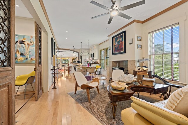 603 Front St, Welaka, FL 32193 - living room with ornamental molding, light wood-style flooring, ceiling fan, and recessed lighting