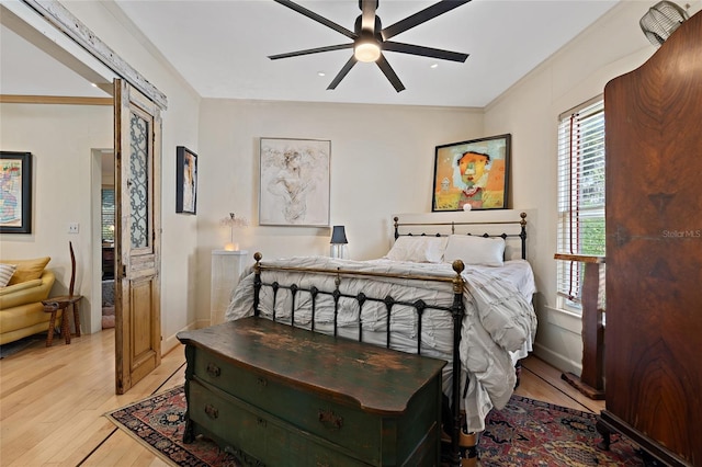 603 Front St, Welaka, FL 32193 - bedroom featuring light wood-type flooring and a ceiling fan