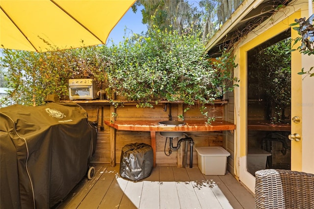 603 Front St, Welaka, FL 32193 - wooden deck featuring area for grilling
