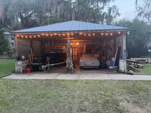 603 Front St, Welaka, FL 32193 - view of parking with a carport, an outbuilding, and driveway