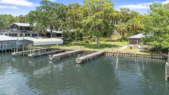 603 Front St, Welaka, FL 32193 - dock with a water view, boat lift, and a yard