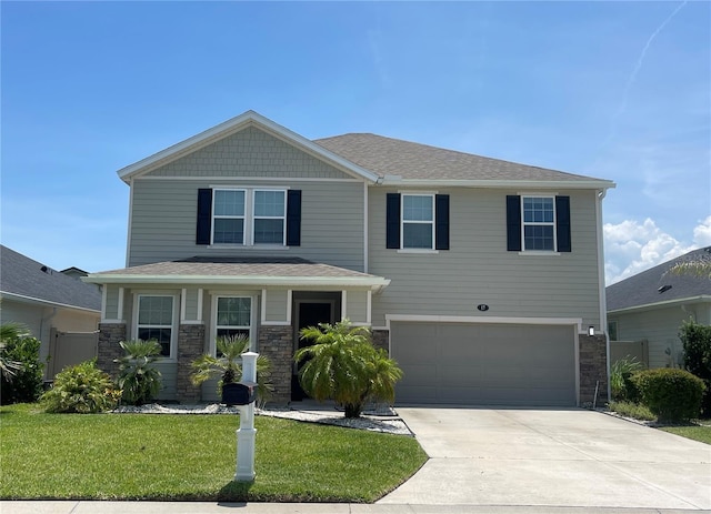 17 Las Casitas Blvd, Palm Coast, FL 32137 - craftsman inspired home with stone siding, a garage, driveway, and a front yard