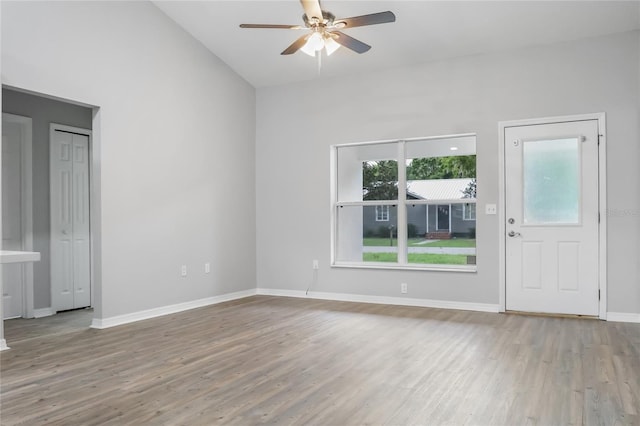 204 S Forsyth St, Bunnell, FL 32110 - spare room featuring a ceiling fan, wood finished floors, and vaulted ceiling
