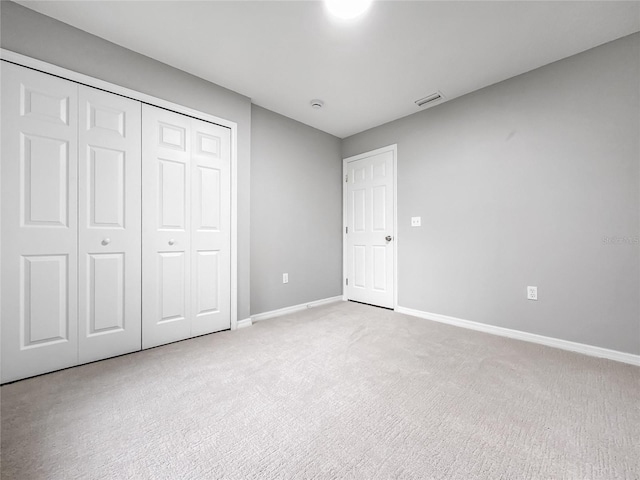 204 S Forsyth St, Bunnell, FL 32110 - unfurnished bedroom featuring carpet and a closet