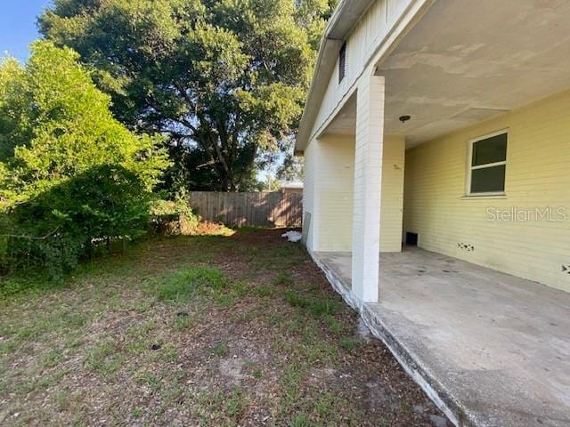 264 Sherwood Ln, Daytona Beach, FL 32117 - view of yard featuring a carport