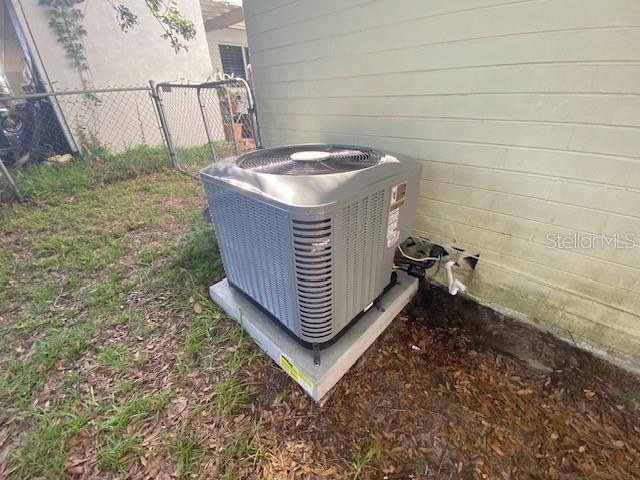 264 Sherwood Ln, Daytona Beach, FL 32117 - exterior view of a central air condition unit