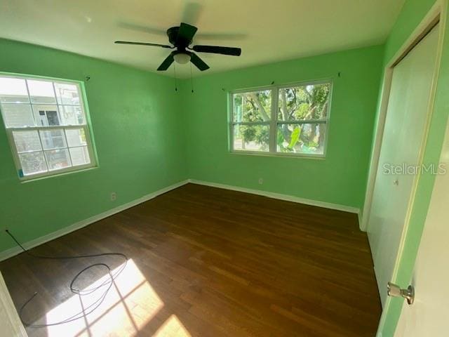 264 Sherwood Ln, Daytona Beach, FL 32117 - unfurnished bedroom featuring wood finished floors, a closet, and ceiling fan