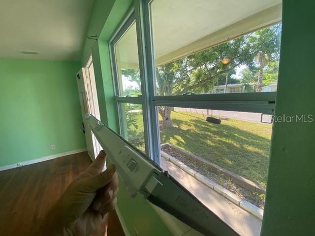 264 Sherwood Ln, Daytona Beach, FL 32117 - detailed view of baseboards and wood finished floors