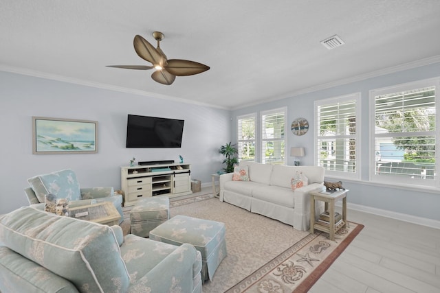 31 Hidden Treasure Dr, Palm Coast, FL 32137 - living area with crown molding and a ceiling fan