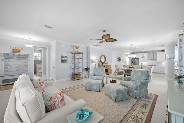 31 Hidden Treasure Dr, Palm Coast, FL 32137 - living area with a ceiling fan, crown molding, recessed lighting, and a chandelier