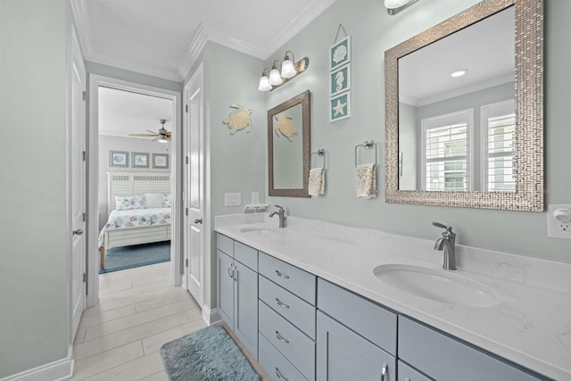 31 Hidden Treasure Dr, Palm Coast, FL 32137 - ensuite bathroom featuring ornamental molding, double vanity, and a ceiling fan