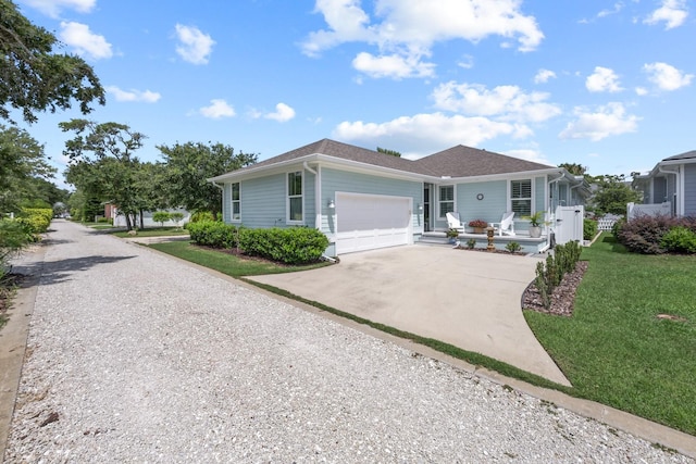 31 Hidden Treasure Dr, Palm Coast, FL 32137 - ranch-style home with driveway, a garage, a front lawn, and covered porch