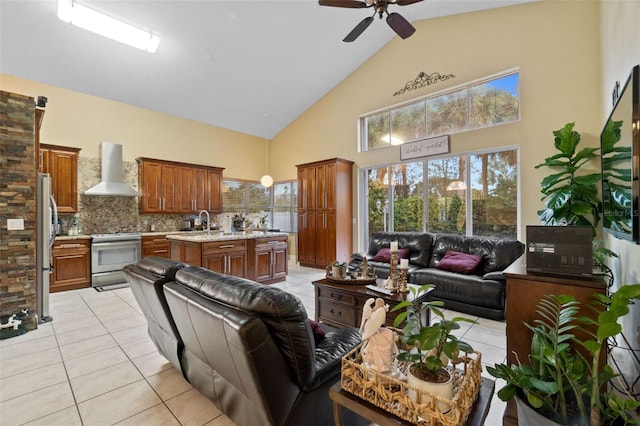 15522 NW 12th Ct, Pembroke Pines, FL 33028 - living area featuring high vaulted ceiling, light tile patterned floors, ceiling fan, and plenty of natural light
