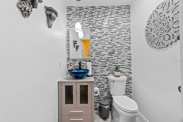 15522 NW 12th Ct, Pembroke Pines, FL 33028 - half bathroom with vanity, decorative backsplash, tile patterned floors, and tile walls