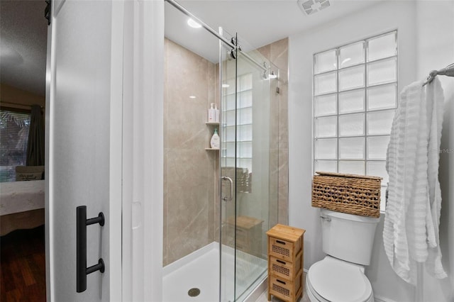 15522 NW 12th Ct, Pembroke Pines, FL 33028 - bathroom featuring a stall shower, ensuite bath, and wood finished floors