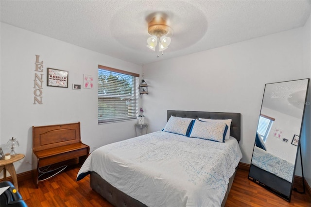 15522 NW 12th Ct, Pembroke Pines, FL 33028 - bedroom featuring wood finished floors, a textured ceiling, and a ceiling fan