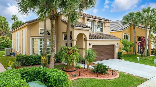 15522 NW 12th Ct, Pembroke Pines, FL 33028 - mediterranean / spanish home featuring stucco siding, a tile roof, concrete driveway, and an attached garage