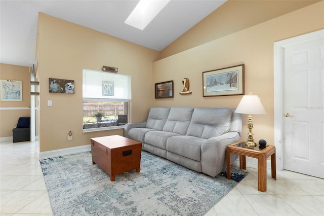 6 Prince Michael Ln, Palm Coast, FL 32164 - living room with vaulted ceiling, a skylight, and light tile patterned floors